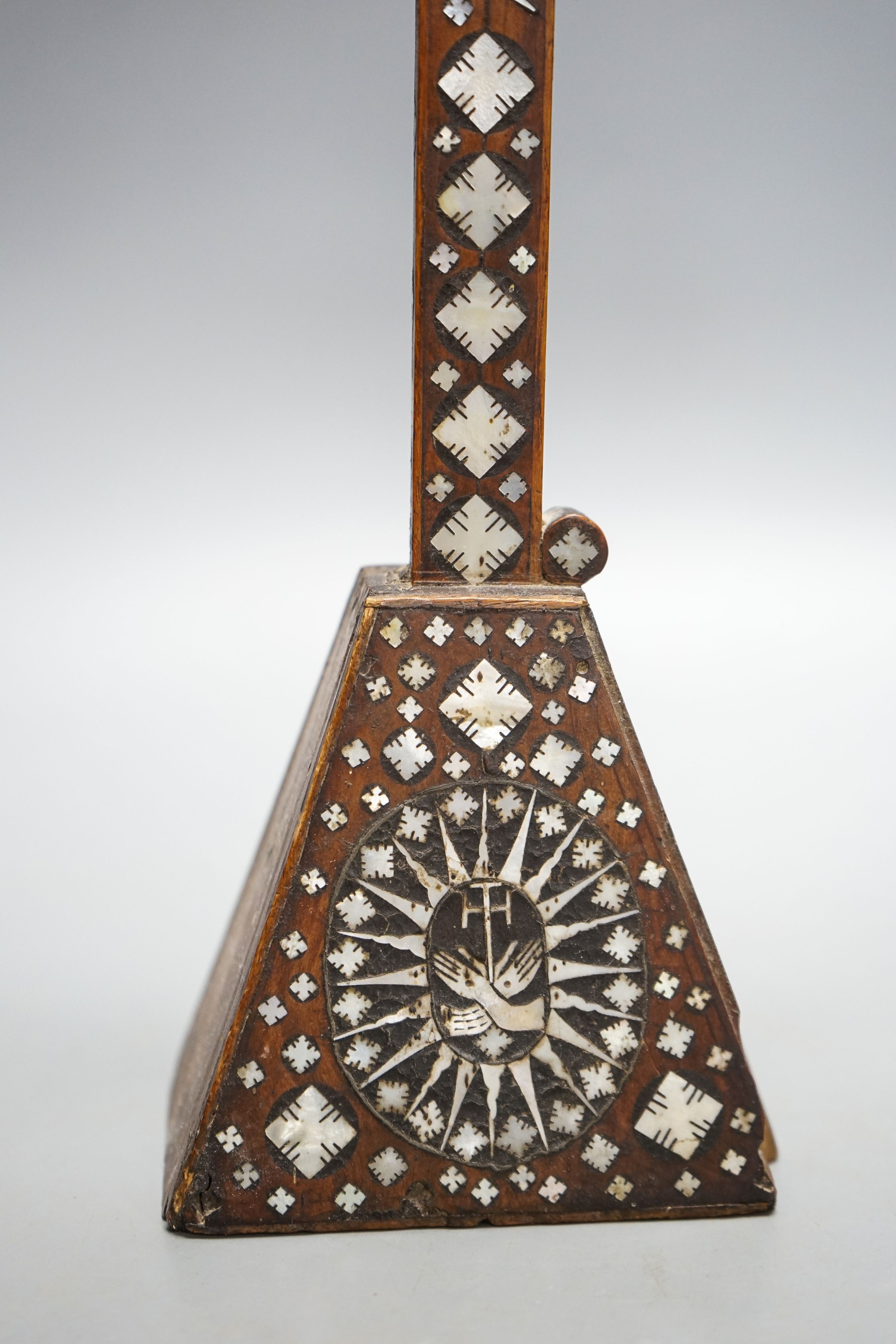 A 19th century Continental fruitwood crucifix with mother of pearl inlay, H 36cm